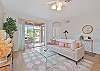 A smart TV and cable in the living. The sliding doors open up to the screened in patio. 