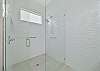 A Spacious walk-in shower in the en-suite primary bathroom