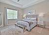 A king size bed in the primary bedroom