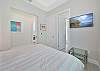A king size bed in the fourth bedroom