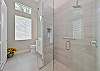 The front guest bath is also and en-suite to the fourth bedroom