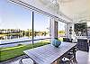 Enjoy the lake view from the oversized screened in lanai