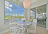 The breakfast nook offers beautiful lake view. Sliding doors open up to the lanai