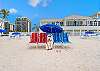 West Bay Club social membership includes access to the Private Beach Club on the Gulf with Beachside Restaurant dining