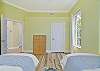 Two twin beds in the third bedroom