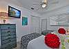 Two twin beds and smart TV in the third bedroom