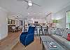 Living with comfortable seating and large smart TV. Seating for 5 at the kitchen island