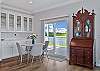 Dining area with sliding doors to the large porch overlooking the bay