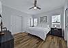 The primary suite is equipped with a king size bed and smart TV