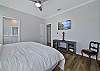 The primary suite is equipped with a king size bed and smart TV