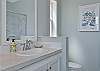 Dual sinks and a shower in the primary bathroom