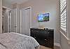 A queen bed in the guest bedroom