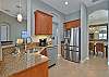 Fully equipped kitchen with breakfast bar and breakfast nook. Formal dining next to the kitchen