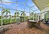 Large, screened in lanai with a lounging, seating and dining area with grill, and best feature; the gorgeous lake view!