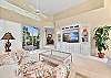 Sliding doors in the living open up to the screened in lanai. Smart TV with cable