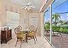 Fully equipped kitchen with breakfast bar and breakfast nook with lake view