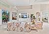 Sliding doors in the living open up to the screened in lanai. Smart TV with cable