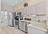 Fully equipped kitchen with breakfast bar and breakfast nook