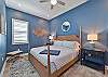 The first Guest Bedroom suite is equipped with a King bed, Smart TV and walk-in closet.