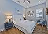 The second Guest Bedroom suite is equipped with a Queen bed and Smart TV