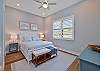 The third Guest Bedroom suite is equipped with a Queen bed and Smart TV