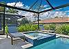 A heated pool with an attached spa and a sun shelf with in-water loungers, perfect for soaking up the Florida sun. A removable pool safety fence gives families with little ones extra peace of mind.