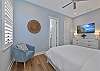 The second Guest Bedroom suite is equipped with a Queen bed and Smart TV