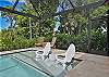 A heated pool with an attached spa and a sun shelf with in-water loungers, perfect for soaking up the Florida sun. A removable pool safety fence gives families with little ones extra peace of mind.