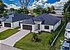 Barefoot in Bonita: Brand-new 4 bed / 4.5 bath pool home with saltwater pool, spa and outdoor kitchen, minutes from Bonita Beach and Barefoot Beach!