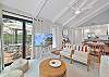 Living with smart TV and sliding doors opening up to the patio