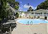 Beautiful pool deck. Pool with spa jets, heated in the winter.