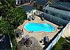 Beautiful pool deck from above. Pool with spa jets. Heated in the winter.