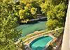 Inverness is the place to be! Direct access into the Comal River and gorgeous views from the pool!