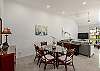 Dining area beside cozy living room