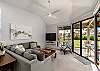 Cozy living room with modern décor and garden view