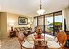 Open-concept dining and living room, steps away from the lanai.