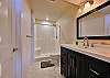 Downstairs bathroom with walk in shower.