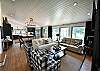 Living Room Space with a smart tv and lake view.