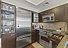 This kitchen comes fully and completely equipped for all your cooking needs during an extended stay.