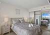 King-sized bed with two night stands.  Ample closet space with ironing board.