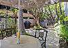 Enjoy a quiet place to relax or picnic under the tropical foliage and close to the pool.