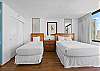 Bedroom offer one single bed and one queen bed.