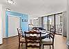 Enjoy your home-cooked meals at the dining table that seats four people.