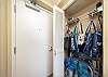 Closet next to the entry door.  Shopping bags and beach chairs and supplies for your use and convenience.