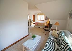 Second floor queen bedroom sitting area