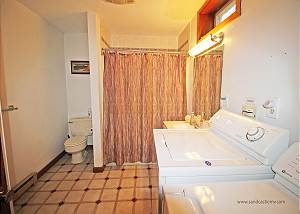 Lower level bathroom with laundry