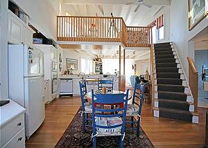 Kitchen with Stairs to Loft Sitting Room  Deck