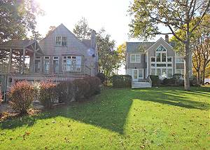 Back of main house with guest house on the left