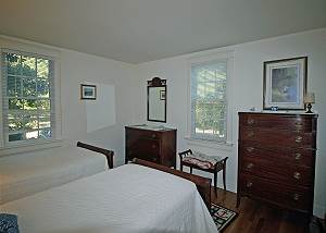 Another view of twin bedroom