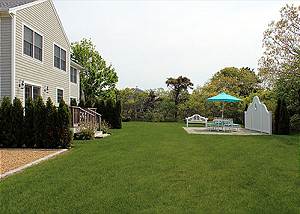 View of shared patio and yard